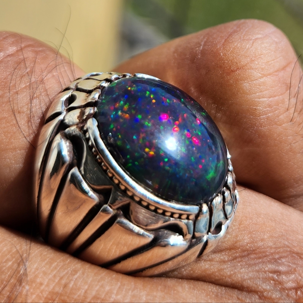 Absolutely stunning natural black opal in Handmade Sterling Silver Ring